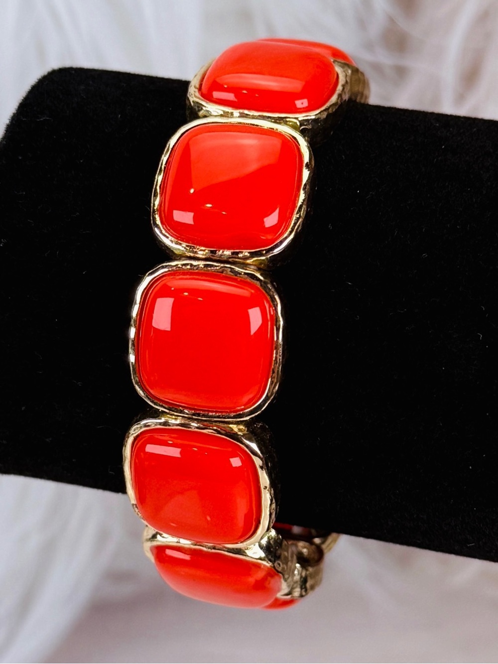 Pretty goldtone, bright coral color stretch bracelet